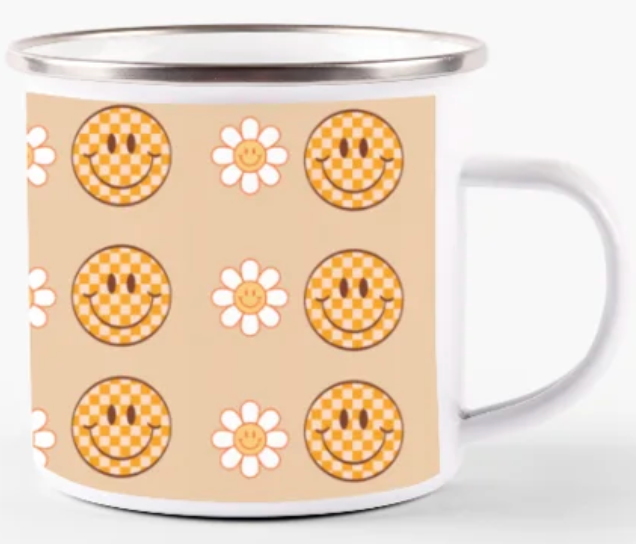 a mug with smiley faces on it