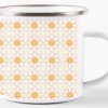 a mug with flowers on it